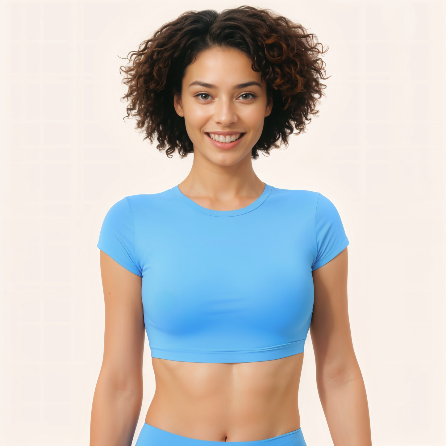 Chicletics core backless tee displayed on a hanger, featuring a relaxed fit and backless design in soft fabric.