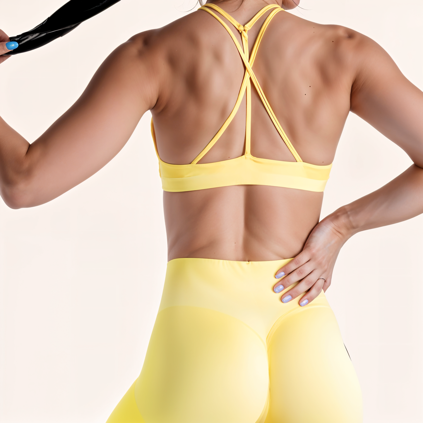 Chicletics Elite Crossback Bra featuring a supportive design with crossed straps and breathable fabric for active wear.