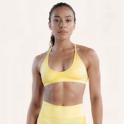 Chicletics Elite Crossback Bra shown on a mannequin, featuring a supportive design with crossback straps and breathable fabric.