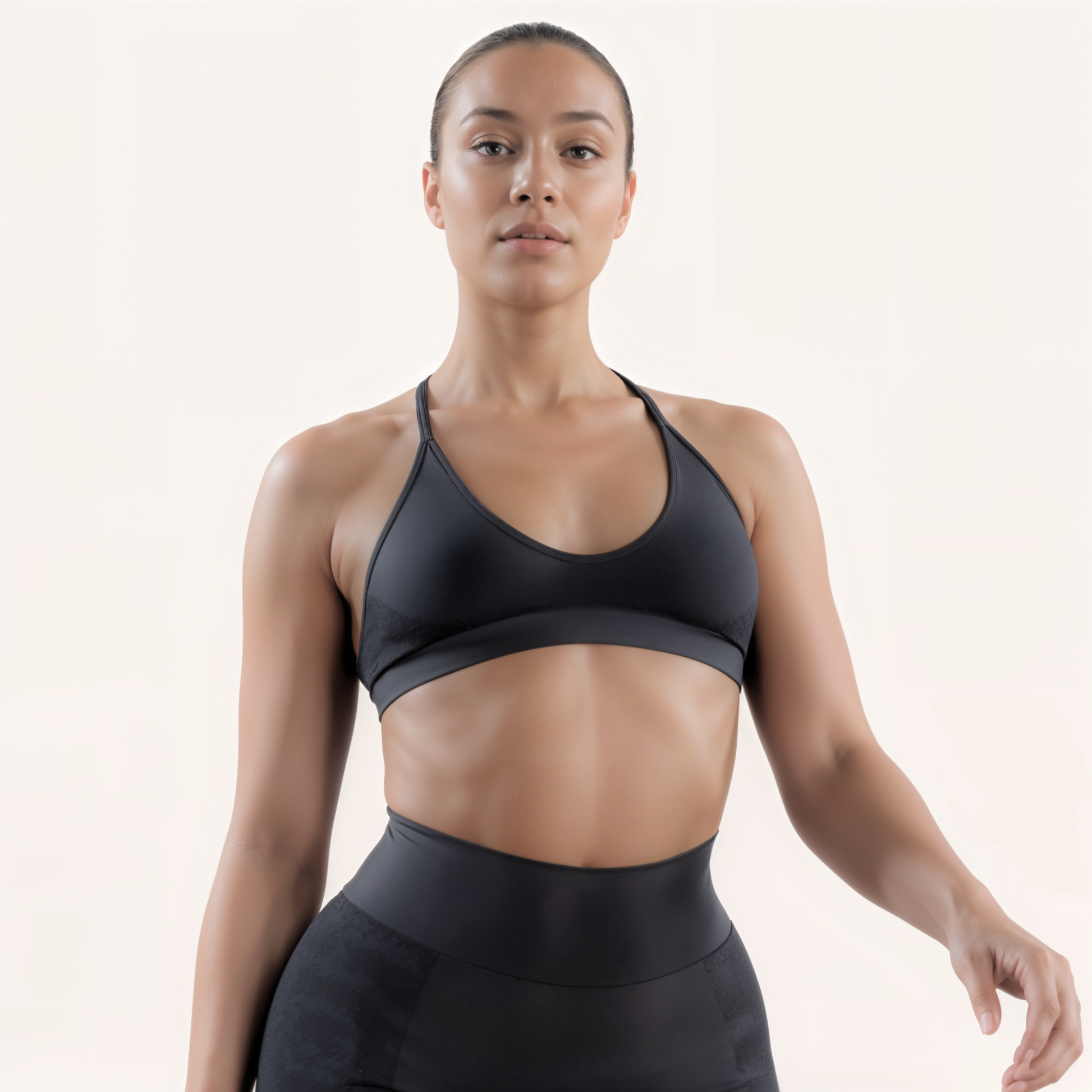 Chicletics Elite Crossback Bra showing black athletic sports bra with crossback straps and supportive fit for activewear.