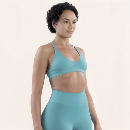 Chicletics Elite Crossback Bra in black with supportive design and adjustable straps, suitable for high-impact workouts.