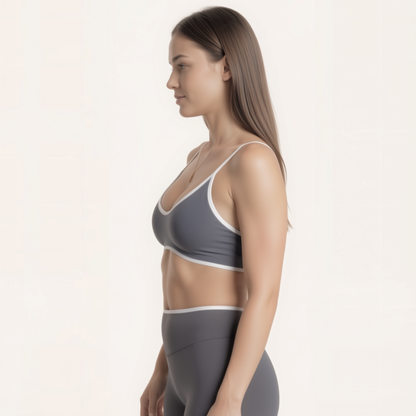 Chicletics Edge Backless Bra with seamless design, black color, and adjustable straps for low-back outfits.