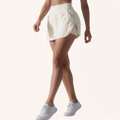 Chicletics Vital Active Skort in black with built-in shorts, lightweight athletic fabric, and a comfortable elastic waistband.