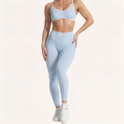 Chicletics EDGE leggings in black, form-fitting athletic pants with a sleek design, shown on a model with a close-up view.
