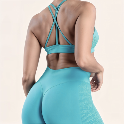 Chicletics ELITE Crossback Bra in black, featuring a supportive design with crossback straps and seamless fabric for comfort.