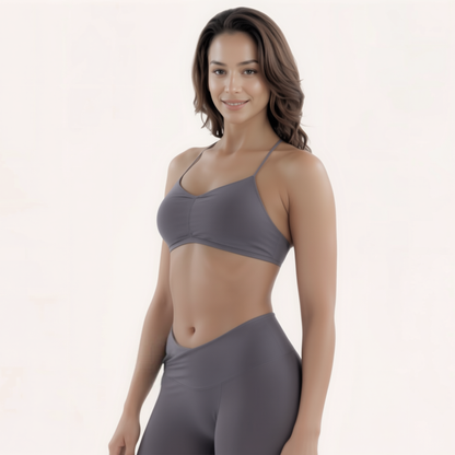 Chicletics Eclipse Crossback Bra shown in black with adjustable straps and breathable fabric, designed for comfort and support.