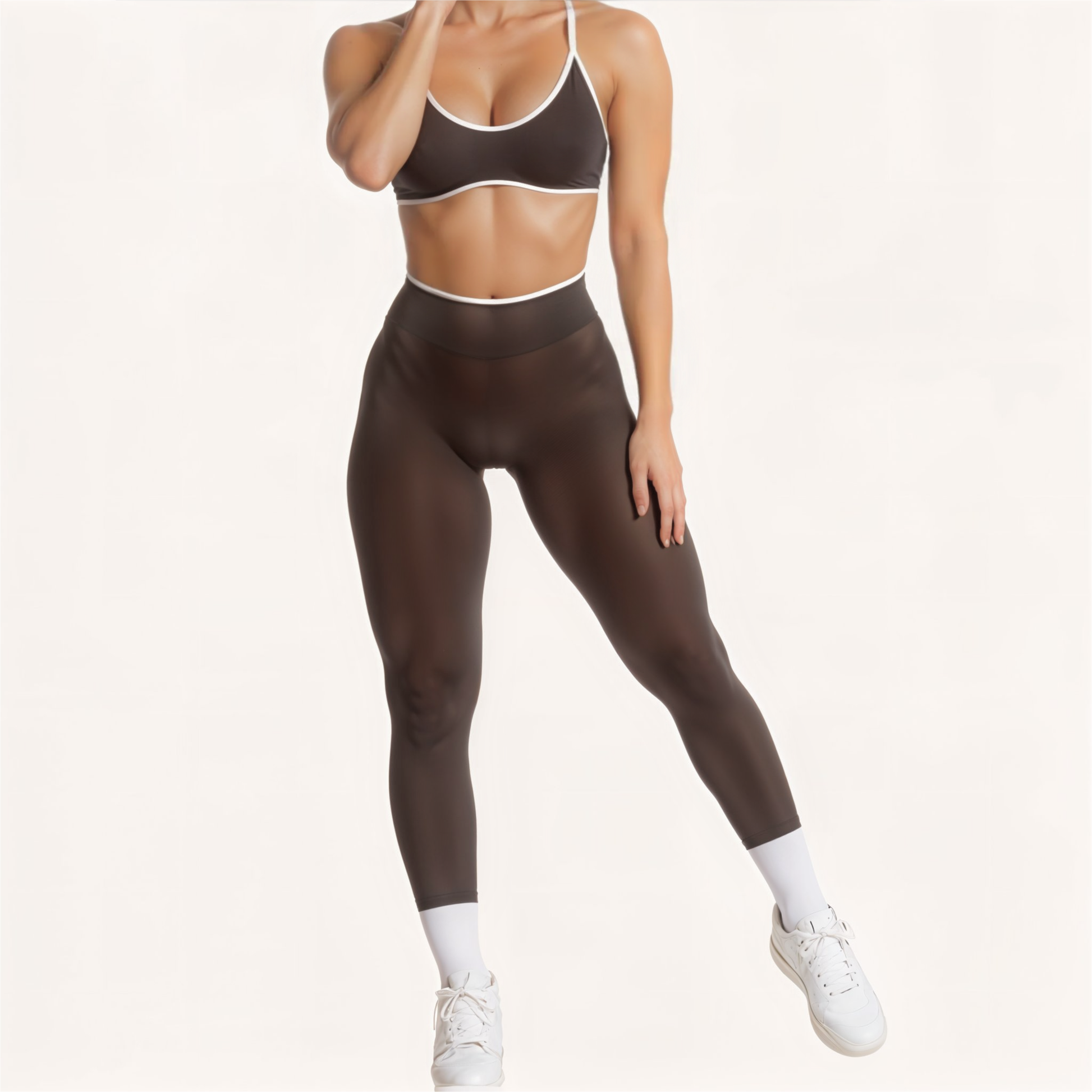 Chicletics EDGE leggings in black with a sleek, high-waisted design and subtle edge detailing, shown on a model.