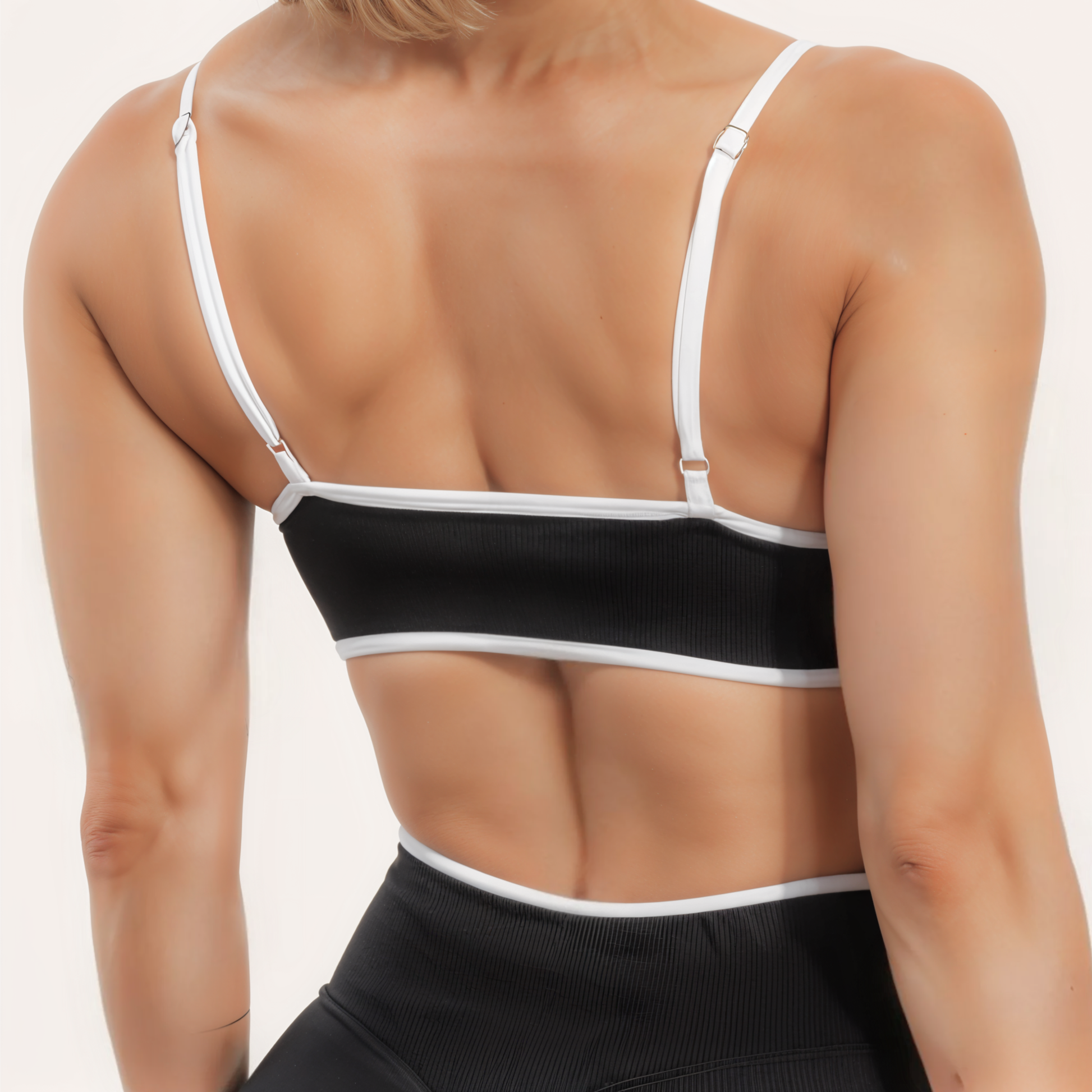 Chicletics Edge Backless Bra shown with smooth, seamless design and adjustable straps for discreet support.