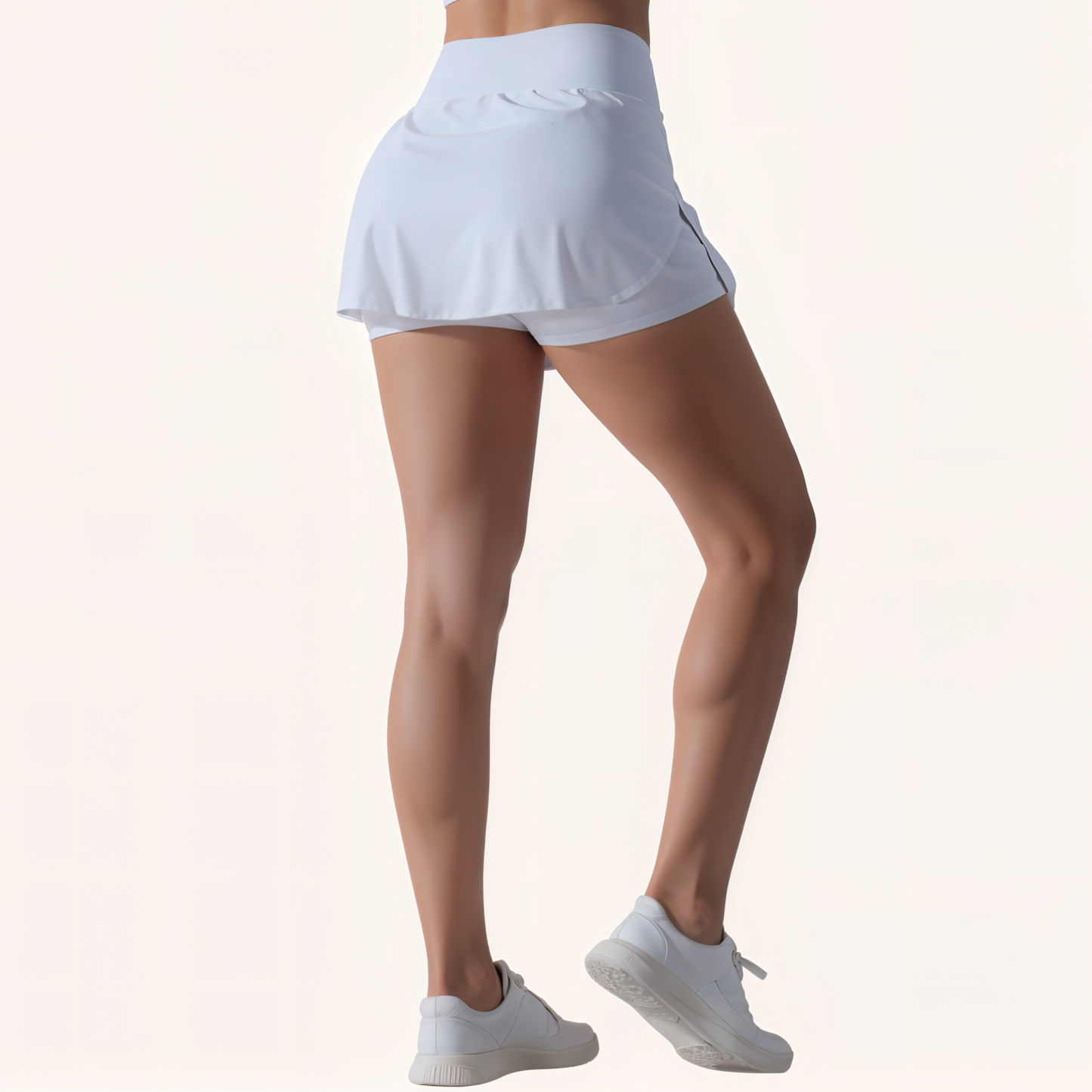 Chicletics Vital Active Skort in black with built-in shorts, lightweight athletic fabric, and subtle logo detail.